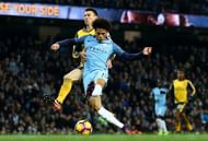 MANCHESTER, ENGLAND - DECEMBER 18: Leroy Sane of Manchester City (C) scores his sides first goal during the Premier League match between Manchester City and Arsenal at the Etihad Stadium on December 18, 2016 in Manchester, England.  (Photo by Clive Brunskill/Getty Images)